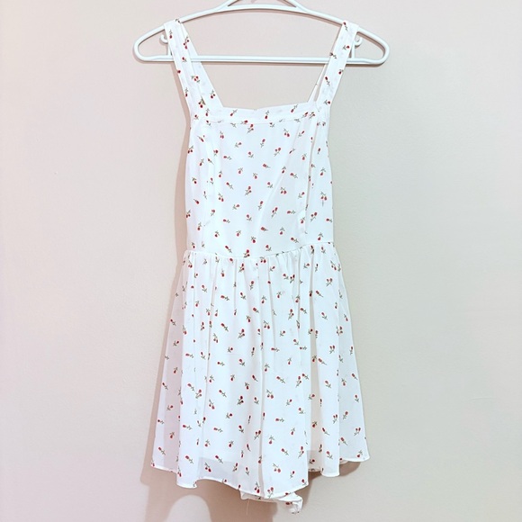 4/$10🎄Forever 21 White Romper w Ditsy Rose Pattern and Criss Cross Straps - Picture 1 of 13